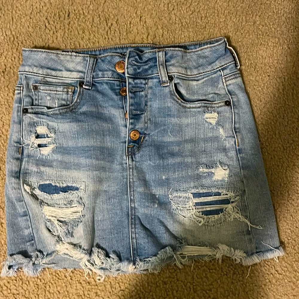 American Eagle distressed blue jean skirt, size 4